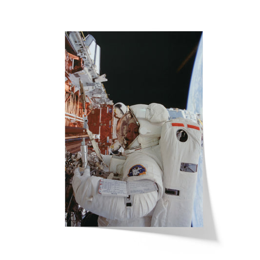 Astronaut Kathryn Thornton Works on Hubble Space Telescope