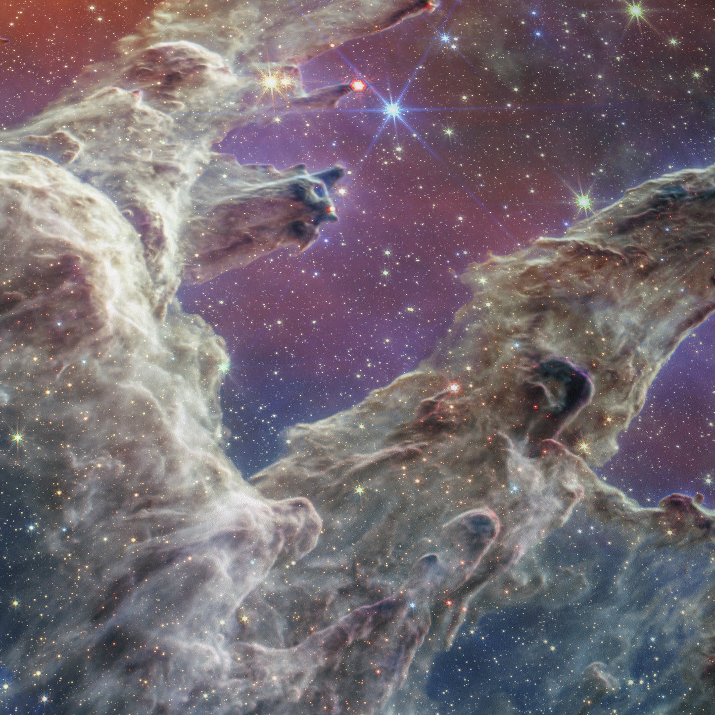 By combining images of the iconic Pillars of Creation