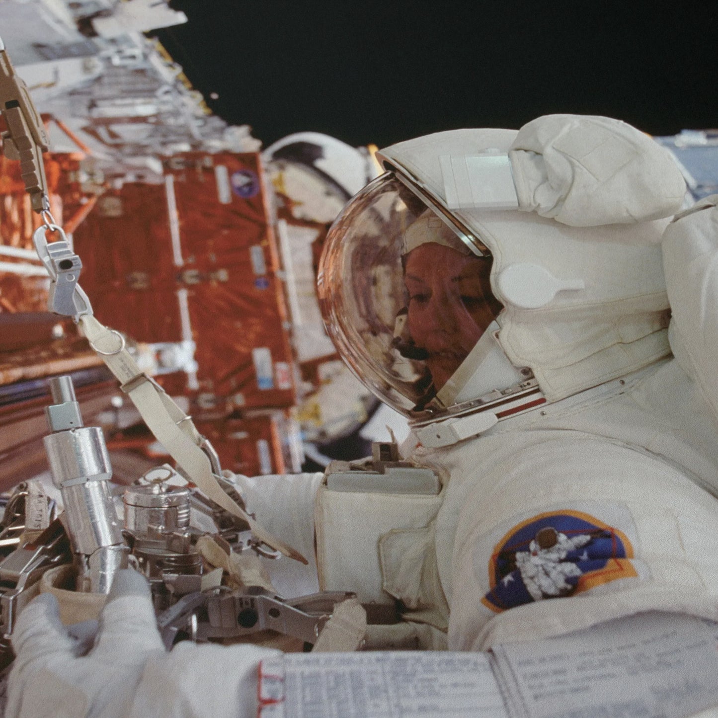 Astronaut Kathryn Thornton Works on Hubble Space Telescope